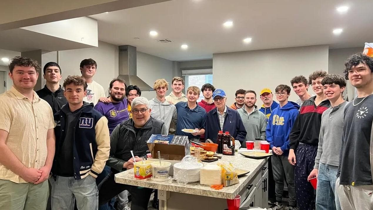 A growing group of Pitt PiLam brothers gathering for a meal together at the House at 225 N Dithridge.